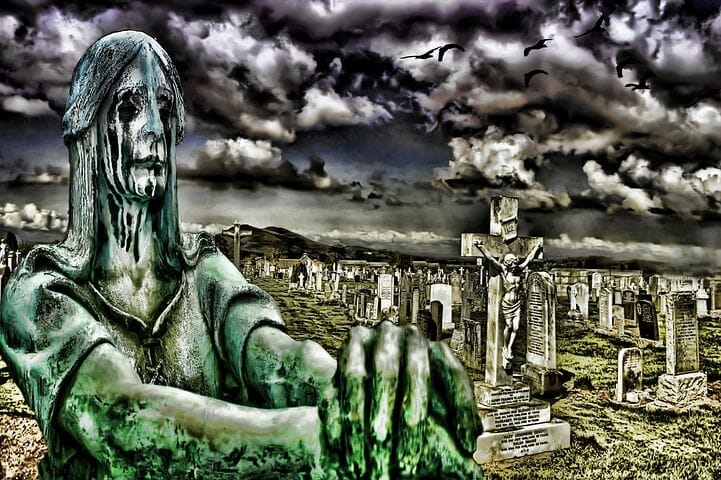 An image depicting a woman coping with personal loss in a cemetery.