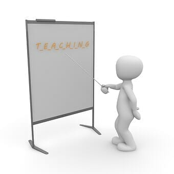 A 3D person does tutoring work, pointing at a whiteboard with the word teaching on it.